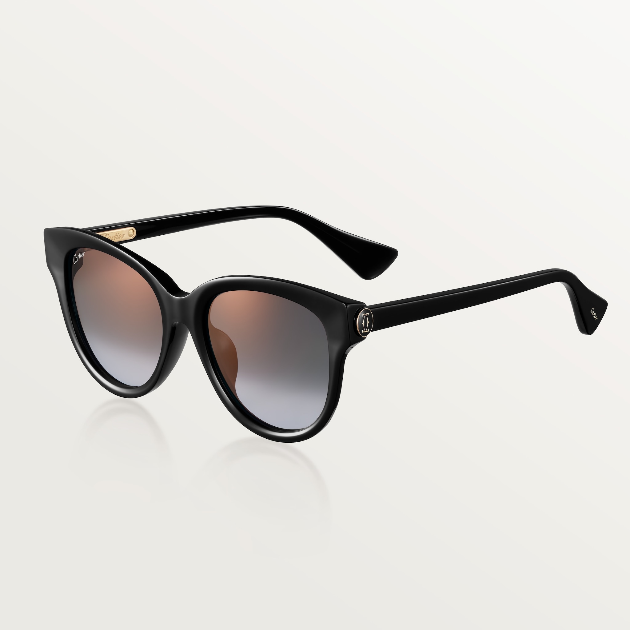 Gafas de sol, C de CartierAcetato negro, lentes grises